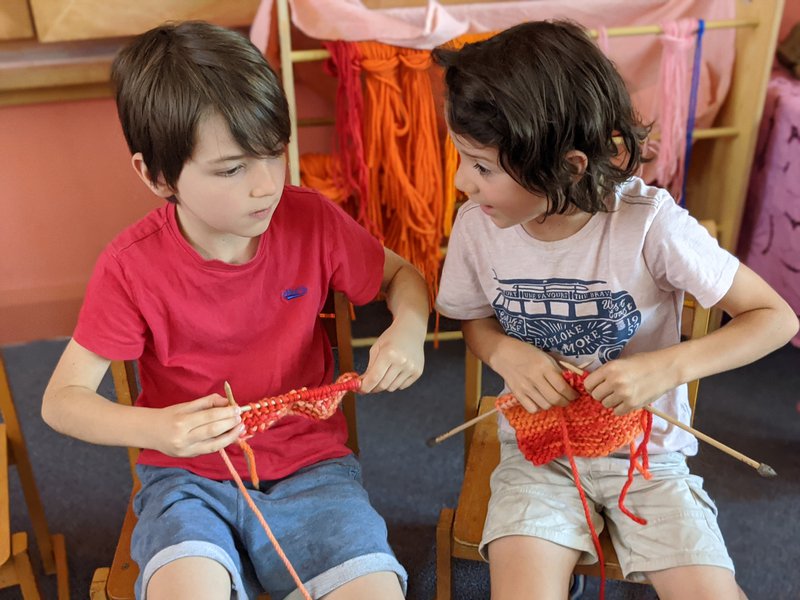 Class 1 learning to knit