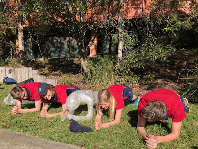 Year 9s wrapped about sculpture group