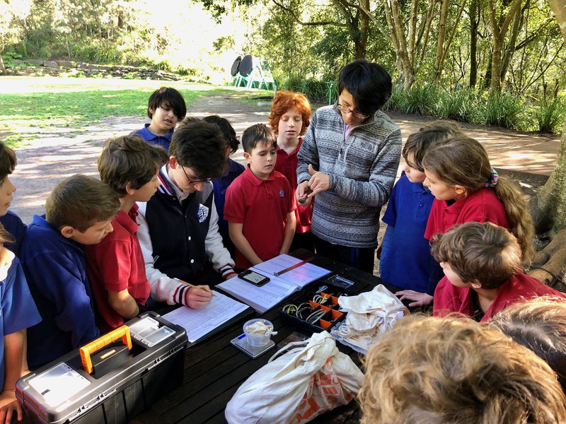 Dr Stanley Tang conducts bird research with Class 4 during National Science Week