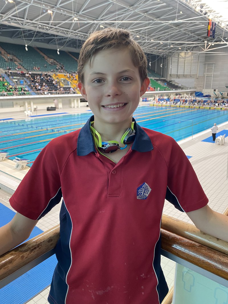 Year 7's Archie swims at the AICES Swimming Championships